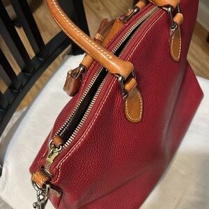 Red Dooney & Bourke purse in good condition.